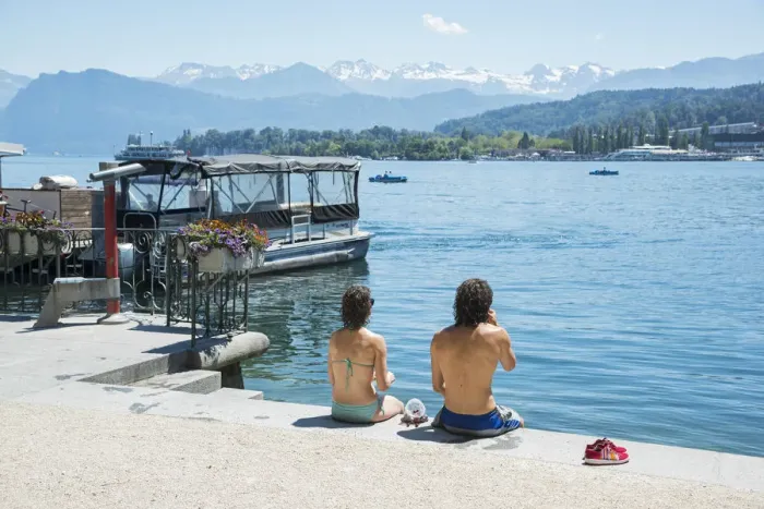 Framed Print : Europe, Switzerland, Lucerne, couple on the lakefront Framed Print : Europe, Switzerland, Lucerne, couple on the lakefront