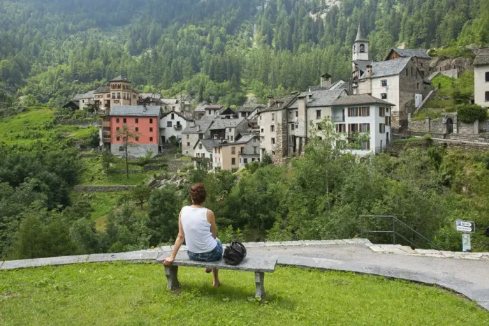 Framed Print : Europe, Switzerland, Ticino, Maggia Valley, A woman admiring Fusio village Framed Print : Europe, Switzerland, Ticino, Maggia Valley, A woman admiring Fusio village