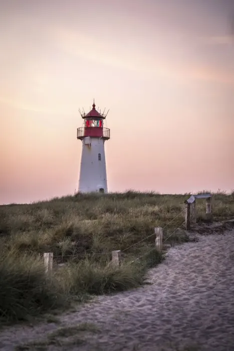 Framed Print : Evening mood at the List-West lighthouse on the Ellenbogen Peninsula, Sylt Framed Print : Evening mood at the List-West lighthouse on the Ellenbogen Peninsula, Sylt