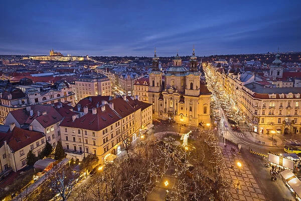 Evening at the old town square with the church of Saint Nicholas, Prague, Czech Republic