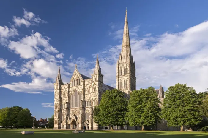 Framed Print : Evening sunshine glows on the ornate facade of Salisbury Cathedral, Wiltshire, England
