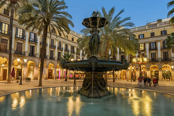 Evening view of the fountain in Plaza Real or Placa Reial, Barcelona, Catalonia, Spain