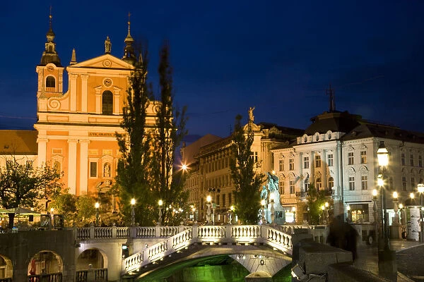 Evening view of Franciscan Church, Presernov Trg Square and Triple Bidge, Ljubljana