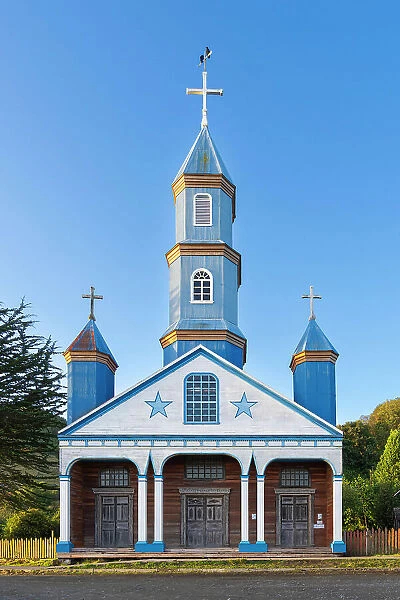 Facade of blue Iglesia Patrimonial Nuestra Senora del Patrocinio Church, Tenaun, Dalcahue, UNESCO, Chiloe Island, Chiloe Province, Los Lagos Region, Chile