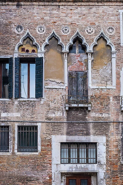 Facade of typical building in the Castello area of Venice, Veneto, Italy