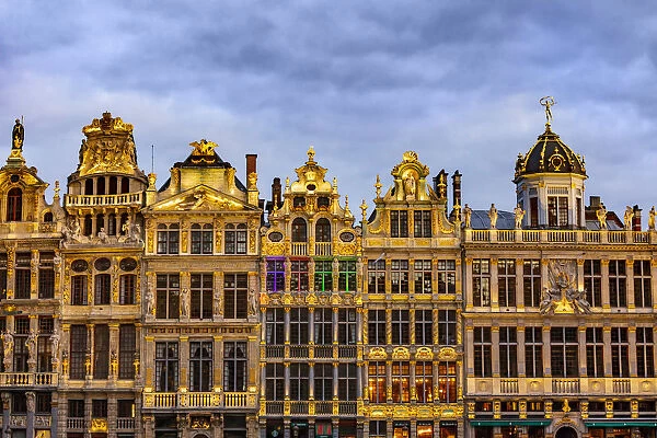 Facade of the typical houses in Brussels Grand Place by night, Belgium