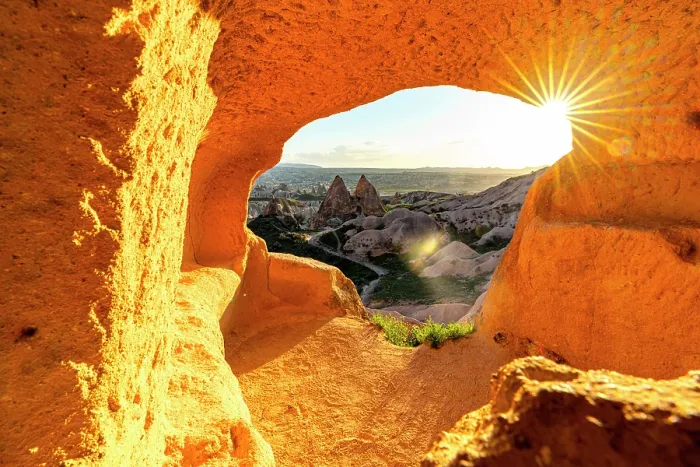 Framed Print : Fairy chimneys through rock opening at sunset, Red Valley, Goreme National Park, Cappadocia, Nevsehir Province, Turkey Framed Print : Fairy chimneys through rock opening at sunset, Red Valley, Goreme National Park, Cappadocia, Nevsehir Province, Turkey