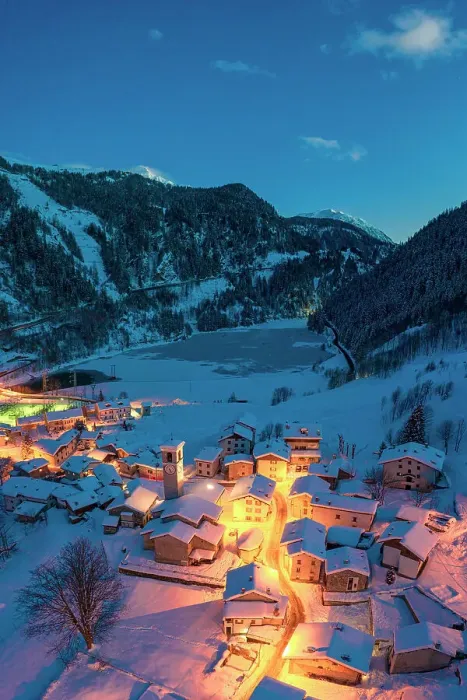 Framed Print : Fairy tale alpine village covered with snow at blue hour, aerial view, Isola, Madesimo, Valle Spluga, Valtellina, Lombardy, Italy Framed Print : Fairy tale alpine village covered with snow at blue hour, aerial view, Isola, Madesimo, Valle Spluga, Valtellina, Lombardy, Italy