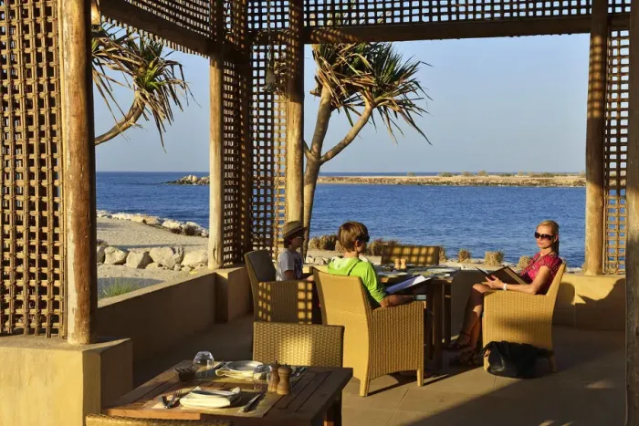Framed Print : Family dining at the Anantara Desert Island Resort, Sir Bani Yas Island, Abu Dhabi Framed Print : Family dining at the Anantara Desert Island Resort, Sir Bani Yas Island, Abu Dhabi