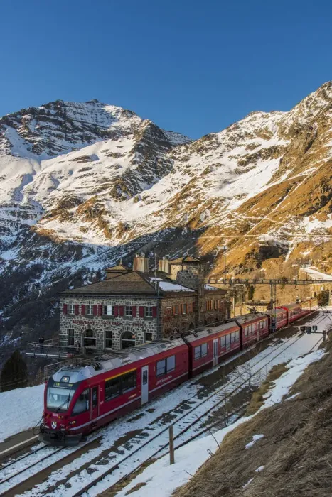 Framed Print : The famous Bernina Express red train at Alp Grum station, Graubunden, Switzerland Framed Print : The famous Bernina Express red train at Alp Grum station, Graubunden, Switzerland
