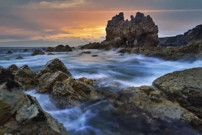 Framed Print : Famous rock at Portizuelo beach at sunrise, Valdes, Luarca, Asturias, Spain Framed Print : Famous rock at Portizuelo beach at sunrise, Valdes, Luarca, Asturias, Spain