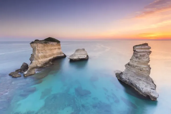 Framed Print : The Faraglioni of Torre Sant Andrea at sunrise. Melendugno, province of Lecce Framed Print : The Faraglioni of Torre Sant Andrea at sunrise. Melendugno, province of Lecce