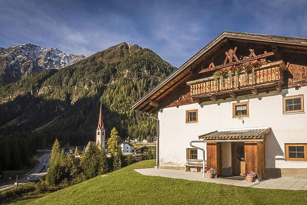 Farm and parish church in St. Sigmund im Sellrain, Tyrol, Austria