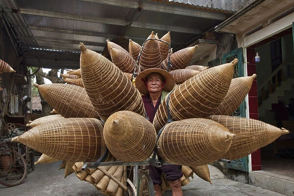 Farmers are knitting fishing tools, Hung Yen province, Vietnam