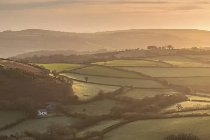 Framed Print : Farmhouse in idyllic rolling countryside at dawn, Dartmoor National Park, Devon, England Framed Print : Farmhouse in idyllic rolling countryside at dawn, Dartmoor National Park, Devon, England