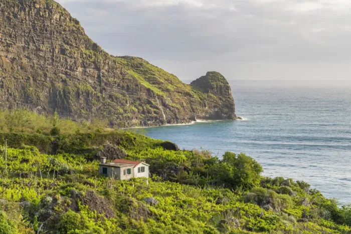 Framed Print : Farmhouse surrounded by fruit plantations and Clerigo Point in the background. Faial Framed Print : Farmhouse surrounded by fruit plantations and Clerigo Point in the background. Faial