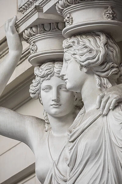 Female statues on the facade of a building, Vienna, Austria