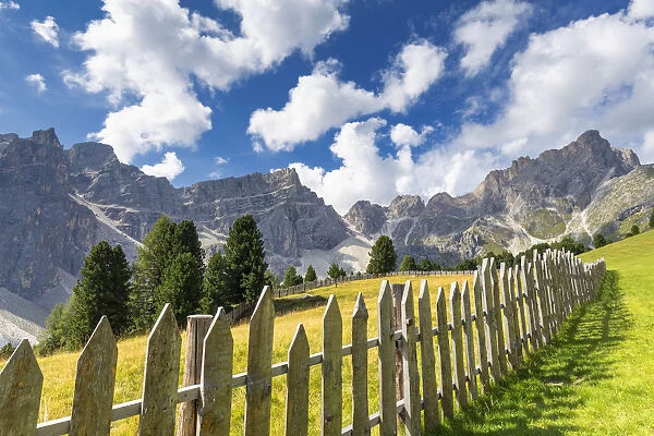 Fence with Puez Group in the background. Longiaru, Badia Valley, South Tyrol