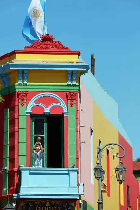 Framed Print : The figure of Lionel Messi holding the World Cup on a balcony of the Caminito de la Boca, Buenos Aires, Argentina Framed Print : The figure of Lionel Messi holding the World Cup on a balcony of the Caminito de la Boca, Buenos Aires, Argentina