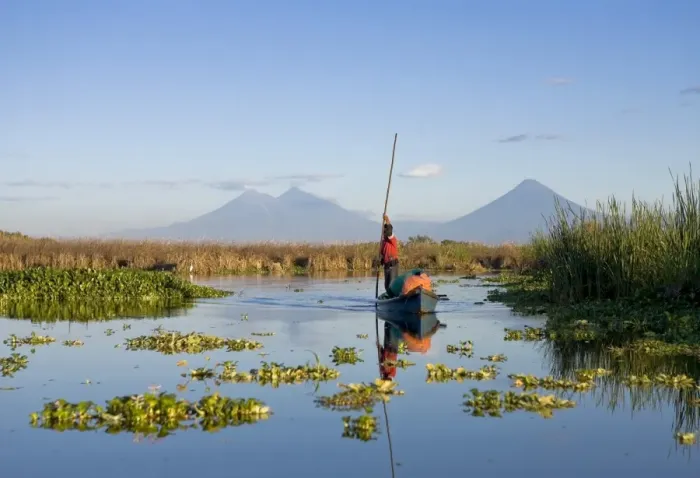 Framed Print : Fisherman, Agua and Pacaya Volcanoes in the background Framed Print : Fisherman, Agua and Pacaya Volcanoes in the background