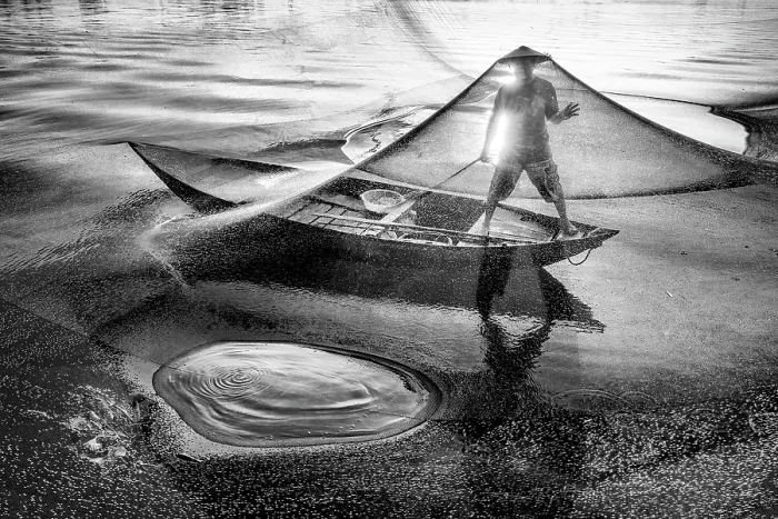 Framed Print : Fisherman checking his net at sunrise, Cua Dai fishing village, near Hoi An, Central Vietnam Framed Print : Fisherman checking his net at sunrise, Cua Dai fishing village, near Hoi An, Central Vietnam