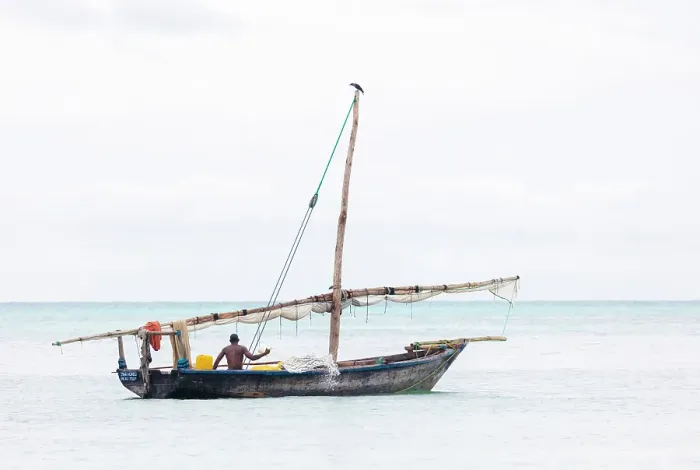 Framed Print : Fisherman on his traditional dhow, Nungwi, Zanzibar, Tanzania Framed Print : Fisherman on his traditional dhow, Nungwi, Zanzibar, Tanzania