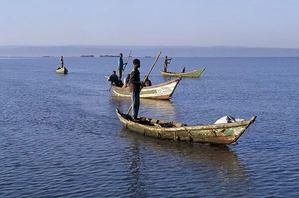 Fishermen return to Dunga Beach soon after sunrise