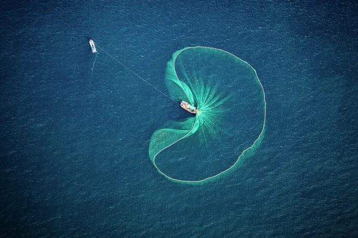 Framed Print : Fishing boat with anchovy net in the blue sea, Tuy An, Phu Yen Province, Vietnam