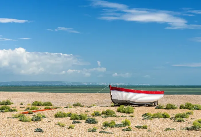 Framed Print : A fishing boat on Dungeness shingle beach, Kent, England Framed Print : A fishing boat on Dungeness shingle beach, Kent, England