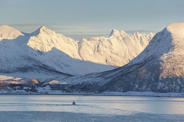 Fishing boat in Fjord, Kvaloya, Troms region, Norway