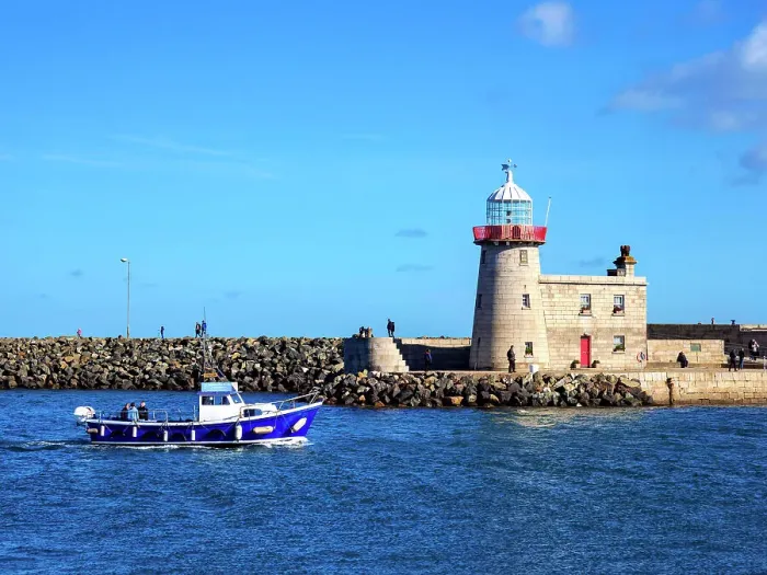Framed Print : Fishing Boat in front of the Howth Lighthouse, Howth, County Dublin, Ireland Framed Print : Fishing Boat in front of the Howth Lighthouse, Howth, County Dublin, Ireland