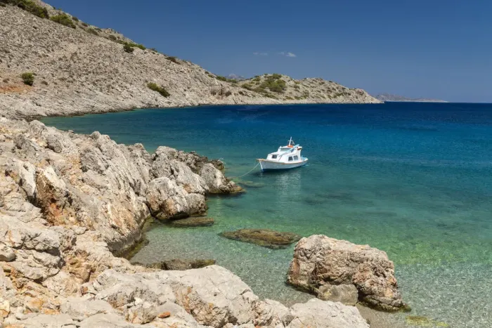 Framed Print : Fishing Boat in Marathounda Bay, Symi Island, Dodecanese Islands, Greece Framed Print : Fishing Boat in Marathounda Bay, Symi Island, Dodecanese Islands, Greece