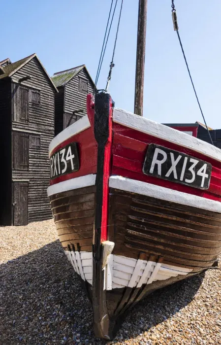 Framed Print : A fishing boat and the net shops ( a weather-proof storage for the fishing gear) Framed Print : A fishing boat and the net shops ( a weather-proof storage for the fishing gear)