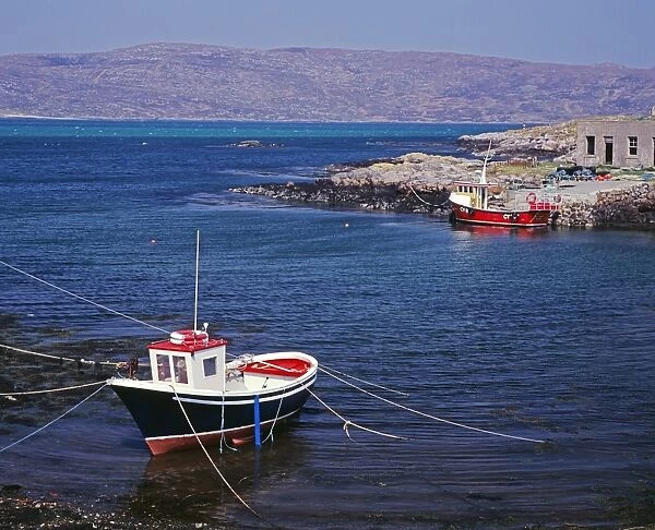 Fishing boat overlooking the Sound of Eriskay from South Uist