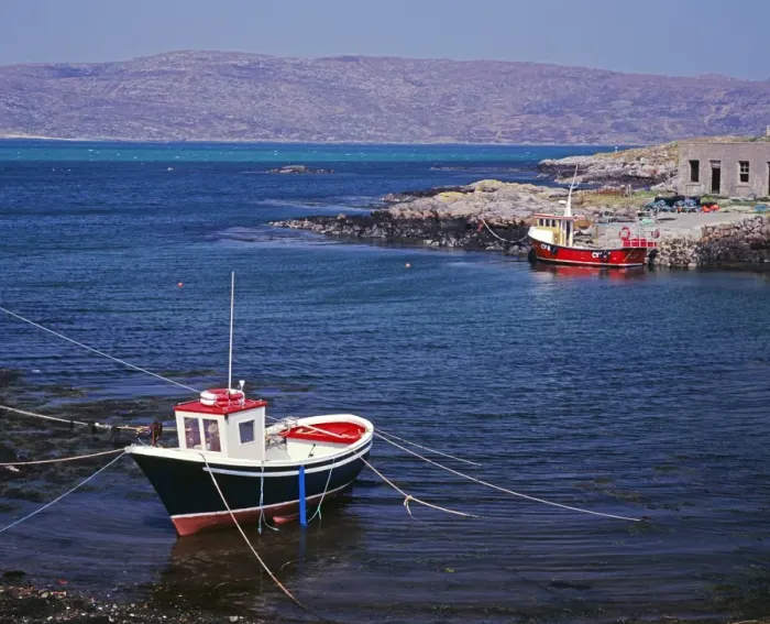 Framed Print : Fishing boat overlooking the Sound of Eriskay from South Uist Framed Print : Fishing boat overlooking the Sound of Eriskay from South Uist