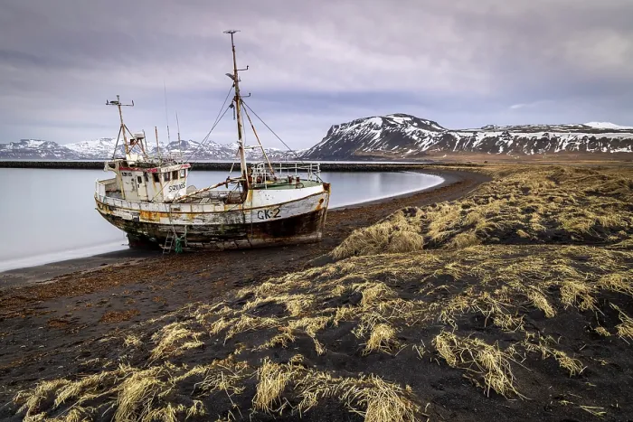 Framed Print : Fishing boat stranded on black sand beach near Rif, Snaefellsnes Peninsula, Iceland Framed Print : Fishing boat stranded on black sand beach near Rif, Snaefellsnes Peninsula, Iceland