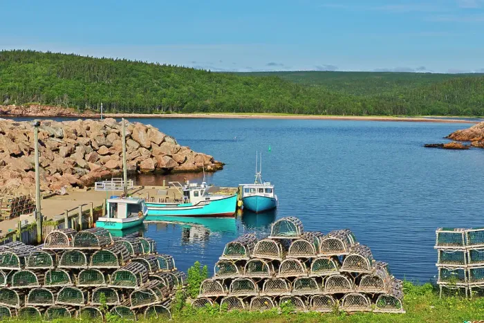 Framed Print : Fishing boats in coastal village. Cabot Trail. Cape Breton Island. Neils Harbour, Nova Scotia, Canada