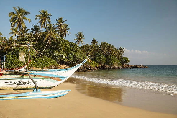 Fishing boats on Devinuwara Beach, Dondra, South Coast, Sri Lanka, Asia