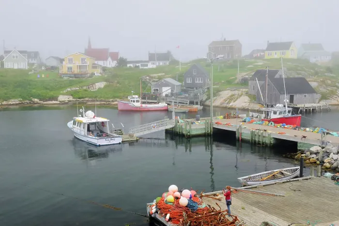 Framed Print : Fishing boats and gear in village Peggy's Cove Nova Scotia, Canada Framed Print : Fishing boats and gear in village Peggy's Cove Nova Scotia, Canada