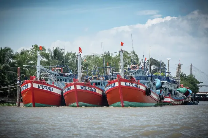 Framed Print : Fishing boats on the Mekong river, Mekong Delta, Vietnam Framed Print : Fishing boats on the Mekong river, Mekong Delta, Vietnam