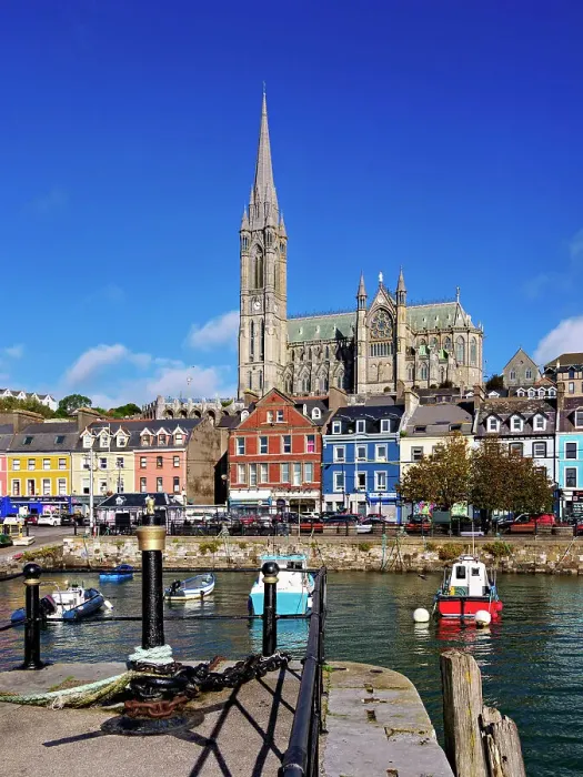 Framed Print : Fishing boats at the waterfront and St. Colman's Cathedral, Cobh, County Cork, Ireland Framed Print : Fishing boats at the waterfront and St. Colman's Cathedral, Cobh, County Cork, Ireland