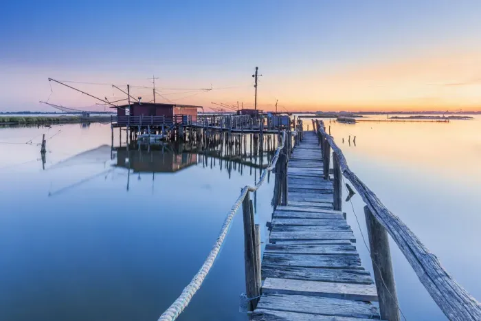Framed Print : Fishing hut on stilts in the Comacchio lagoon at dawn, Ferrara, Emilia Romagna, Italy Framed Print : Fishing hut on stilts in the Comacchio lagoon at dawn, Ferrara, Emilia Romagna, Italy