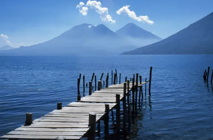 Framed Print : Fishing jetty on Lake Atitlan with volcanoes Toliman and Atitlan behind Framed Print : Fishing jetty on Lake Atitlan with volcanoes Toliman and Atitlan behind