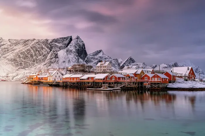 Framed Print : Fishing village of Sakrisoy under a dramatic sky at sunset, Reine, Lofoten Islands, Norway