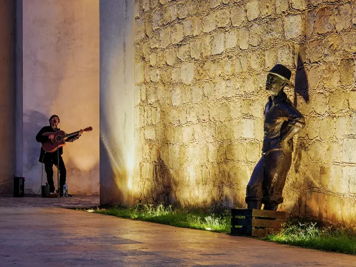 Framed Print : Fishmonger statue and the musician playing guitar at Puerta de Mar at dusk, Campeche City, Campeche State, Mexico Framed Print : Fishmonger statue and the musician playing guitar at Puerta de Mar at dusk, Campeche City, Campeche State, Mexico