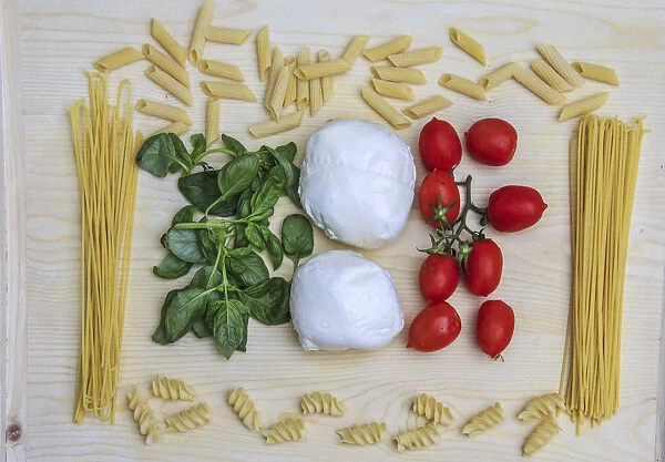 Flag created with Italian pasta, basil, mozzarella and tomatoes. Lombardy. Italy. Europe