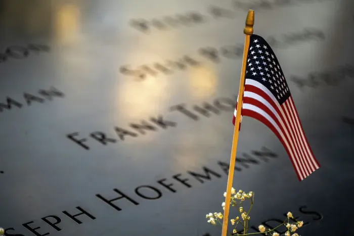 Framed Print : US flag on the parapet boarding the pool of the National September 11 Memorial & Museum, Manhattan, New York, USA Framed Print : US flag on the parapet boarding the pool of the National September 11 Memorial & Museum, Manhattan, New York, USA