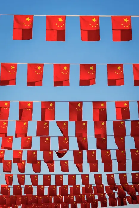 Framed Print : Flags displayed on city street, Beijing, China