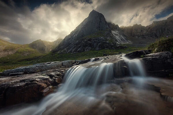 Flakstad fjord with a small stream coming down to the sea. Lofoten Islands, Norway
