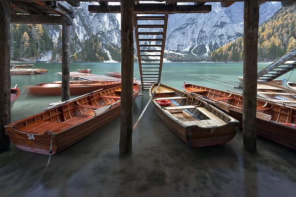 The floating dock and boats at Braies Lake, Natural Park fanes-sennes-braies, Bolzano